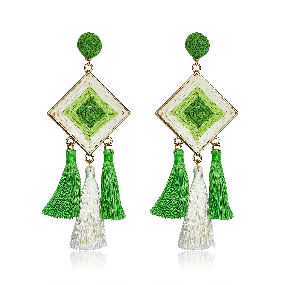 Diamond shaped woven earrings in green and ivory with tassel drops, named Emerald Breeze Drops.