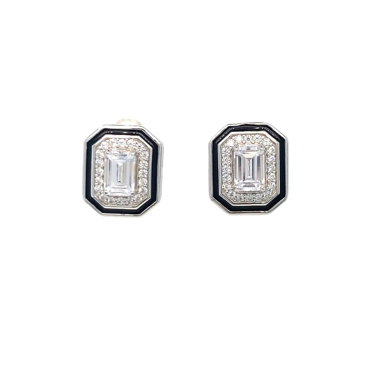 Pair of diamond earrings with black and white design on a white background