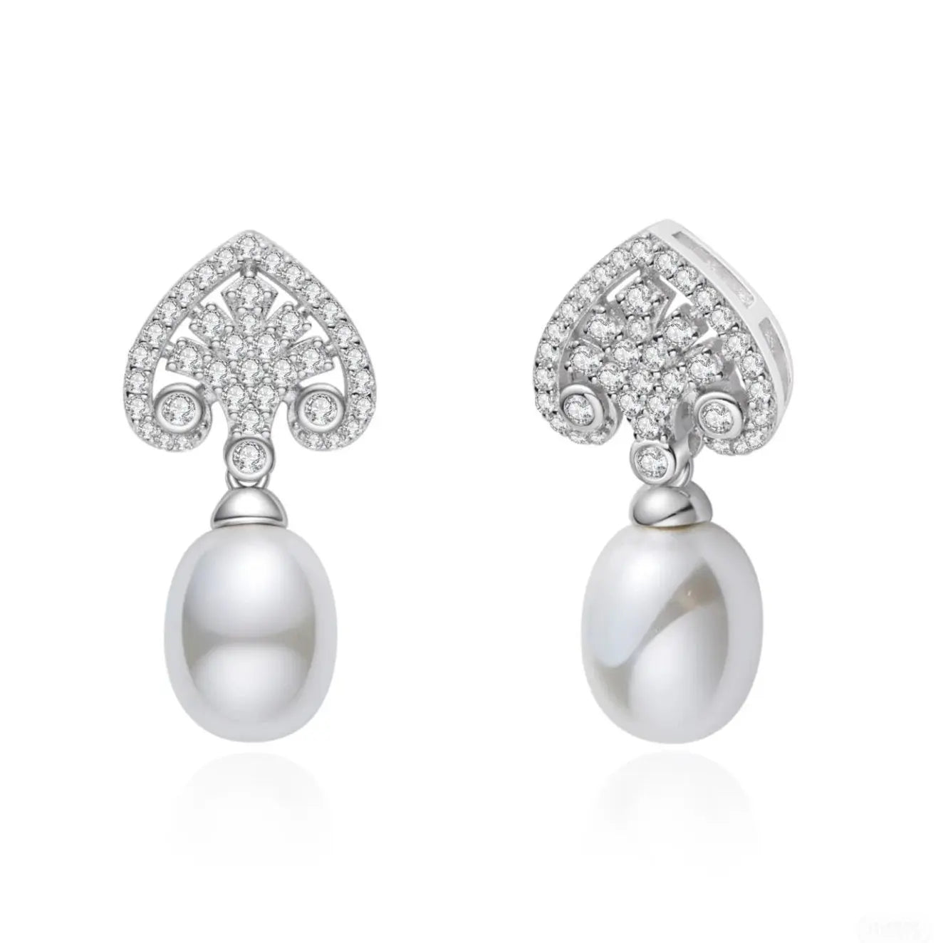Pair of pearl earrings with diamond-like stones on a white background