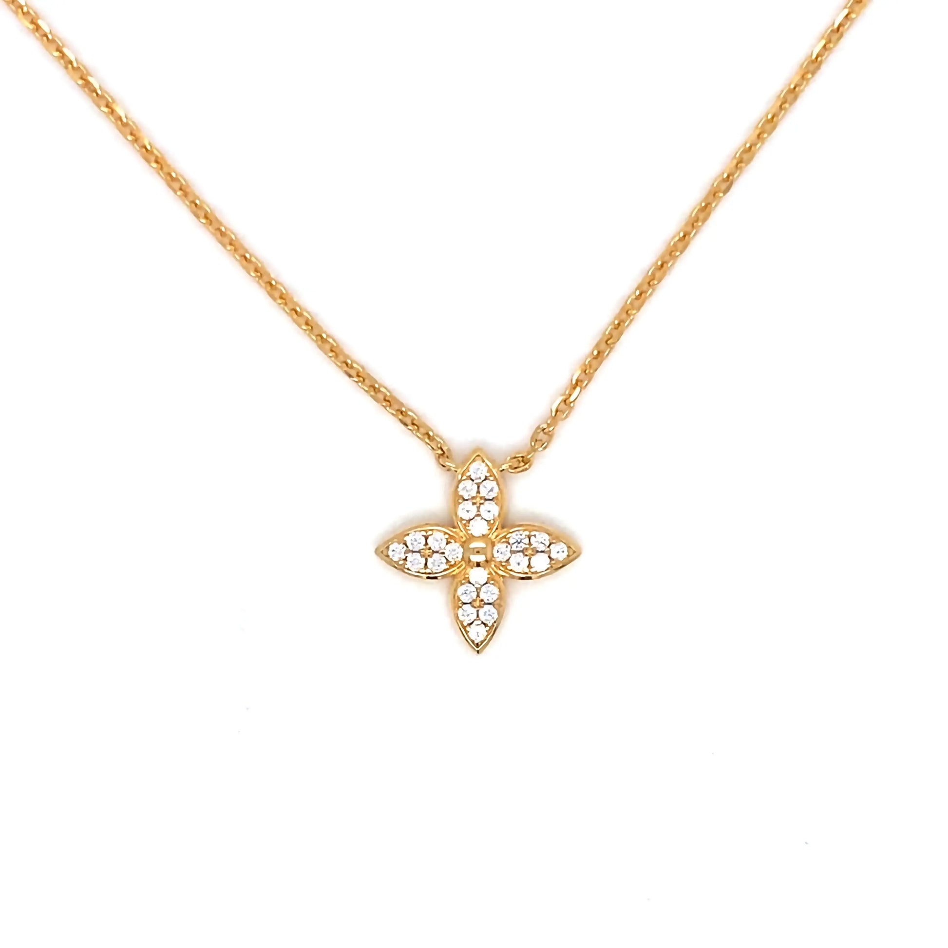 Gold necklace with a butterfly-shaped pendant on a white background