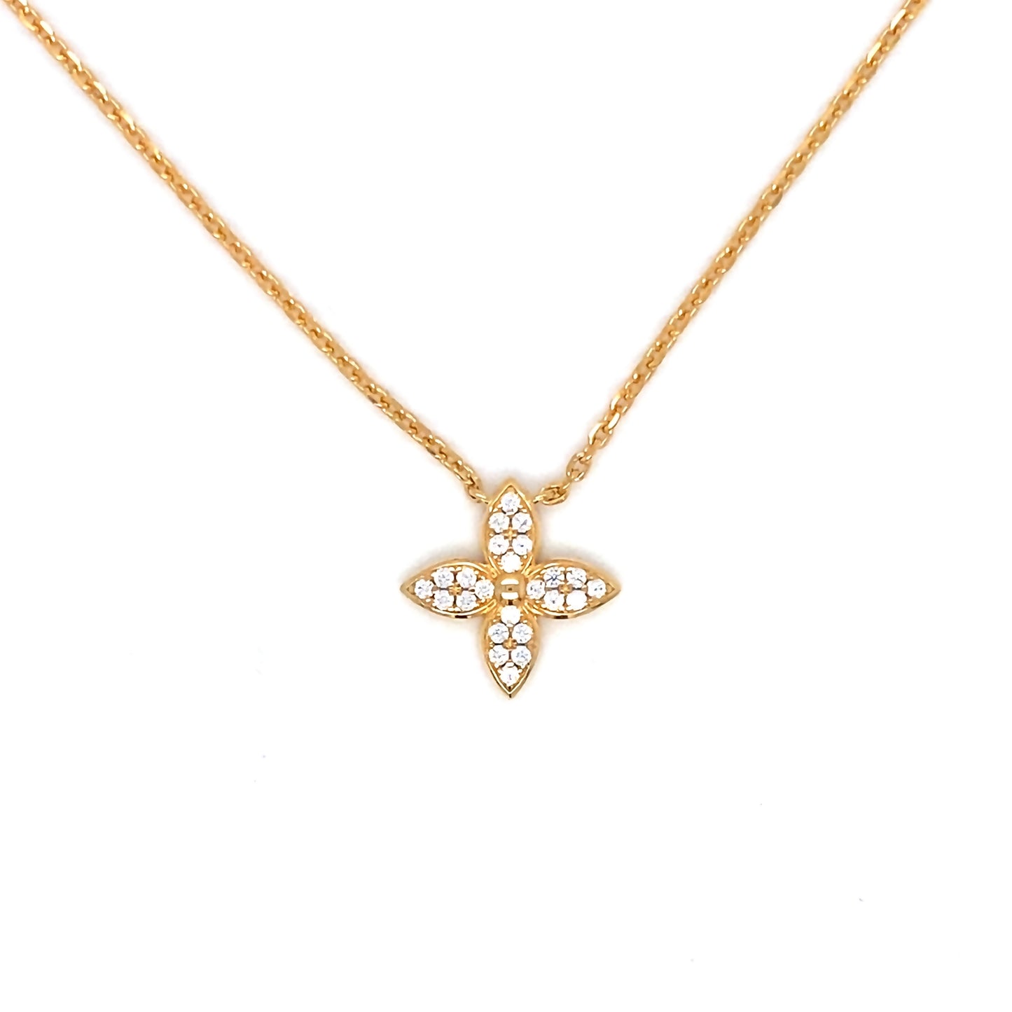 Gold necklace with a butterfly-shaped pendant on a white background