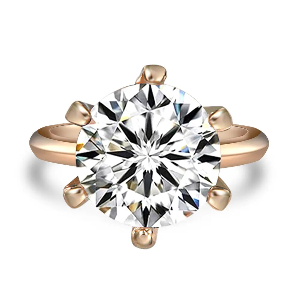 Anna Zuckerman 4 Carat Solitaire Engagement Ring featuring a brilliant lab-created diamond in a six-prong 18k rose gold setting. Elegant and dainty design ideal for weddings or proposals.