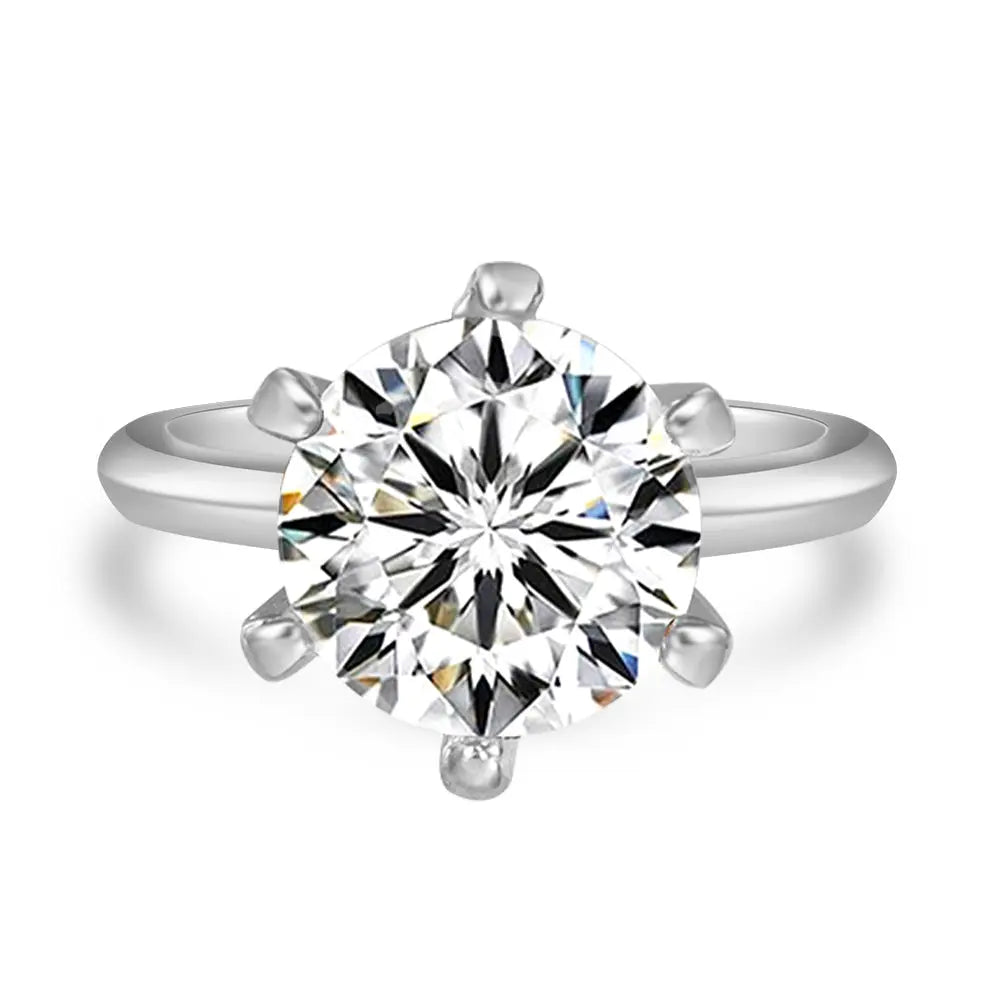 Anna Zuckerman 4 Carat Solitaire Engagement Ring featuring a brilliant lab-created diamond in a six-prong 18k rose gold setting. Elegant and dainty design ideal for weddings or proposals.