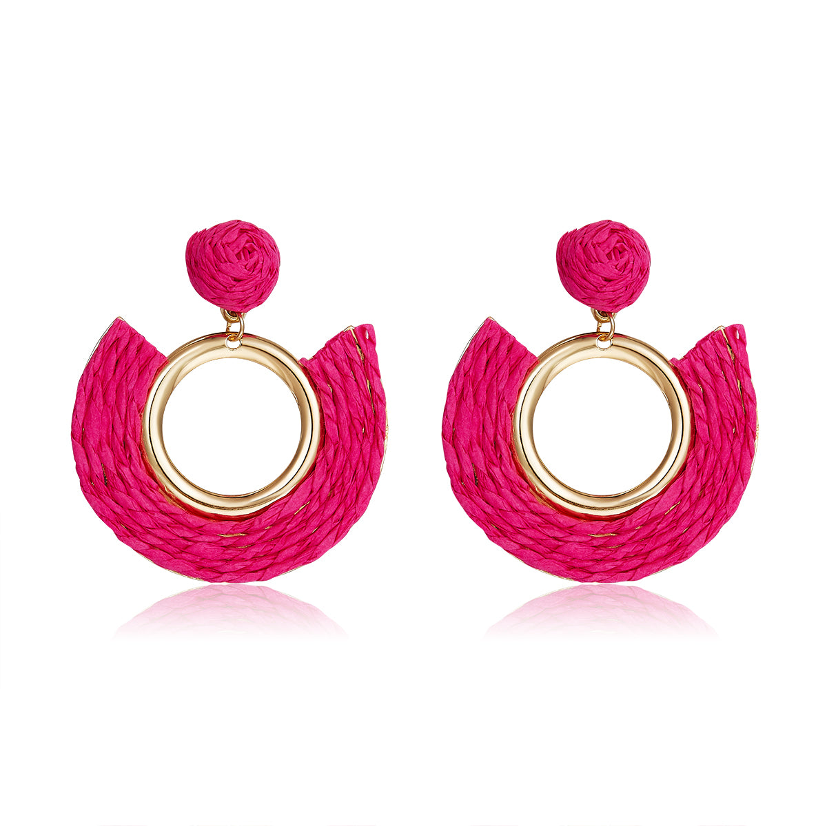 Fuchsia pink half-moon woven earrings with central gold ring.
