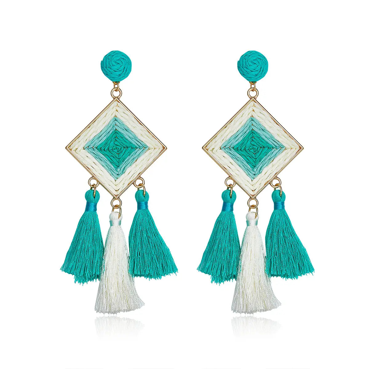 Turquoise and white woven diamond-shaped earrings with tassels.