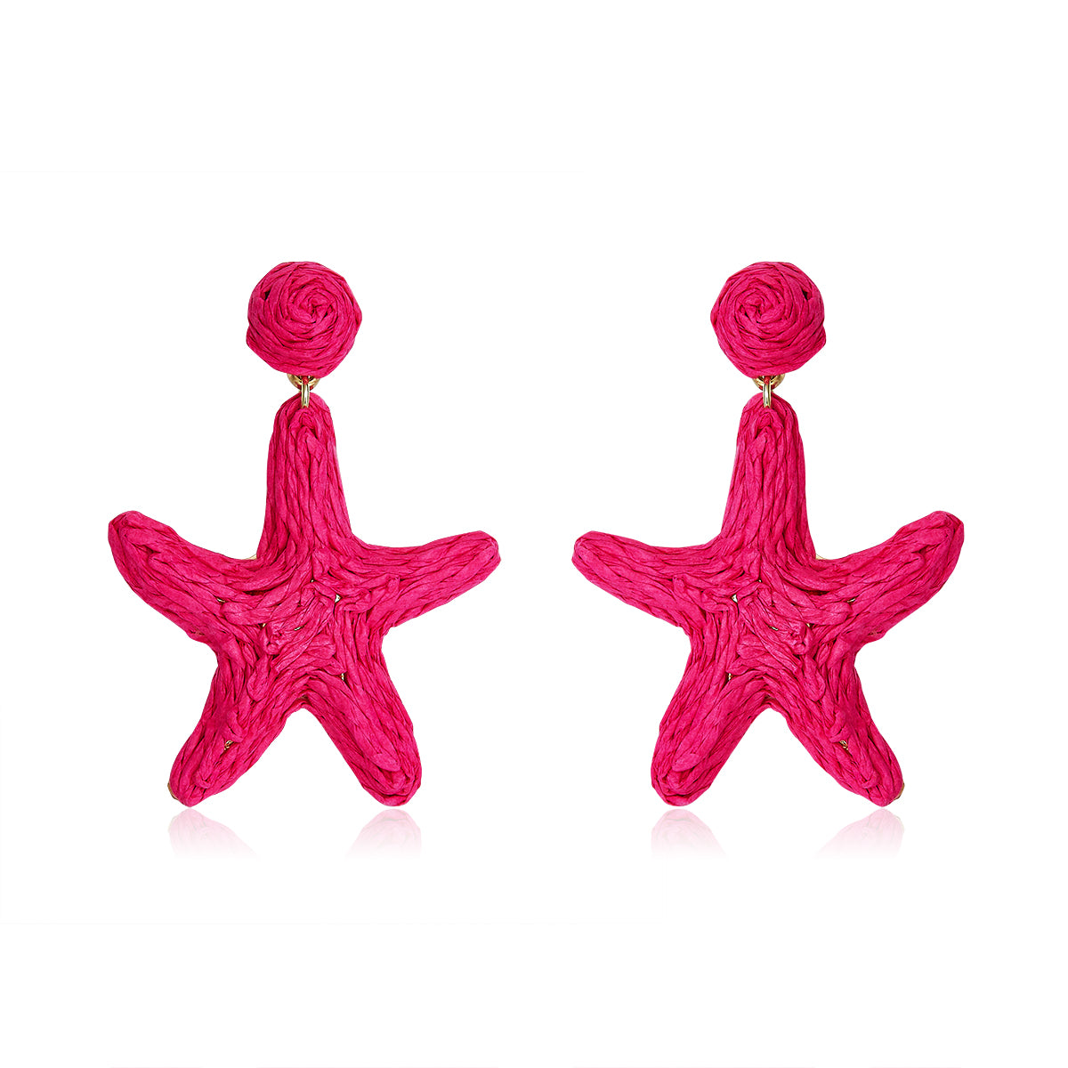 Bright hot pink starfish-shaped earrings made from woven fibers, called Coral Star Drops.