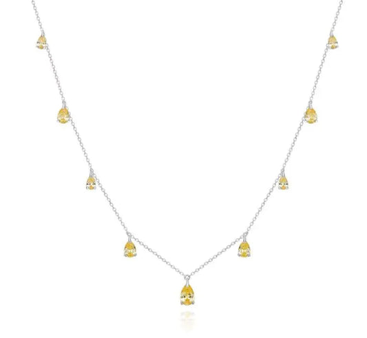 Necklace with small yellow pendants on a white background