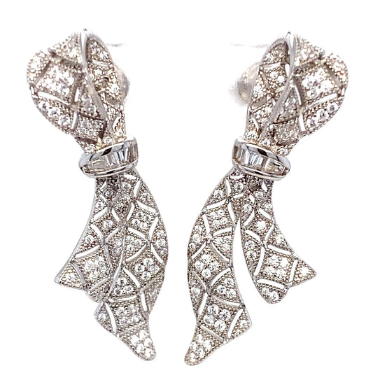 Pair of diamond earrings on a white background