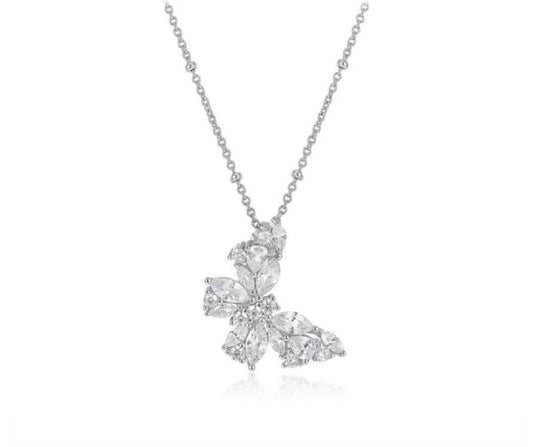 Diamond butterfly necklace on a white background
