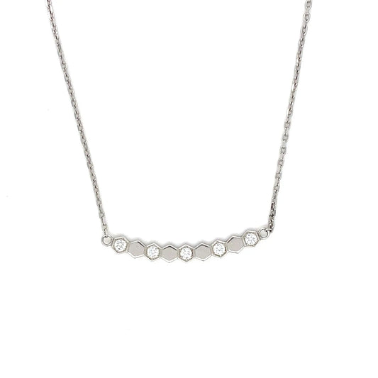Silver necklace with small diamonds on a white background