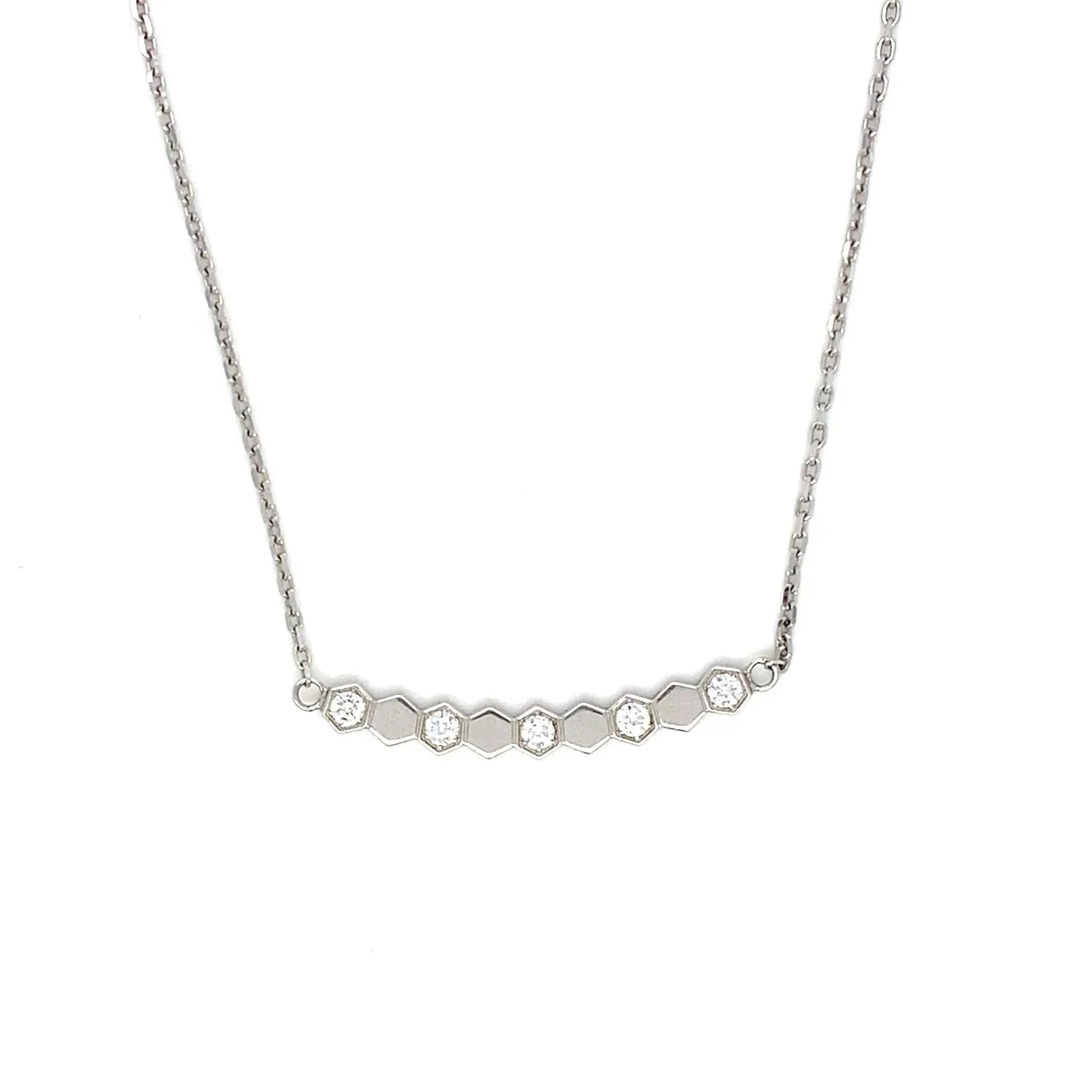 Silver necklace with small diamonds on a white background