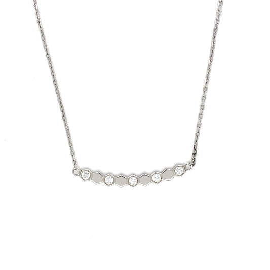 Silver necklace with small diamonds on a white background