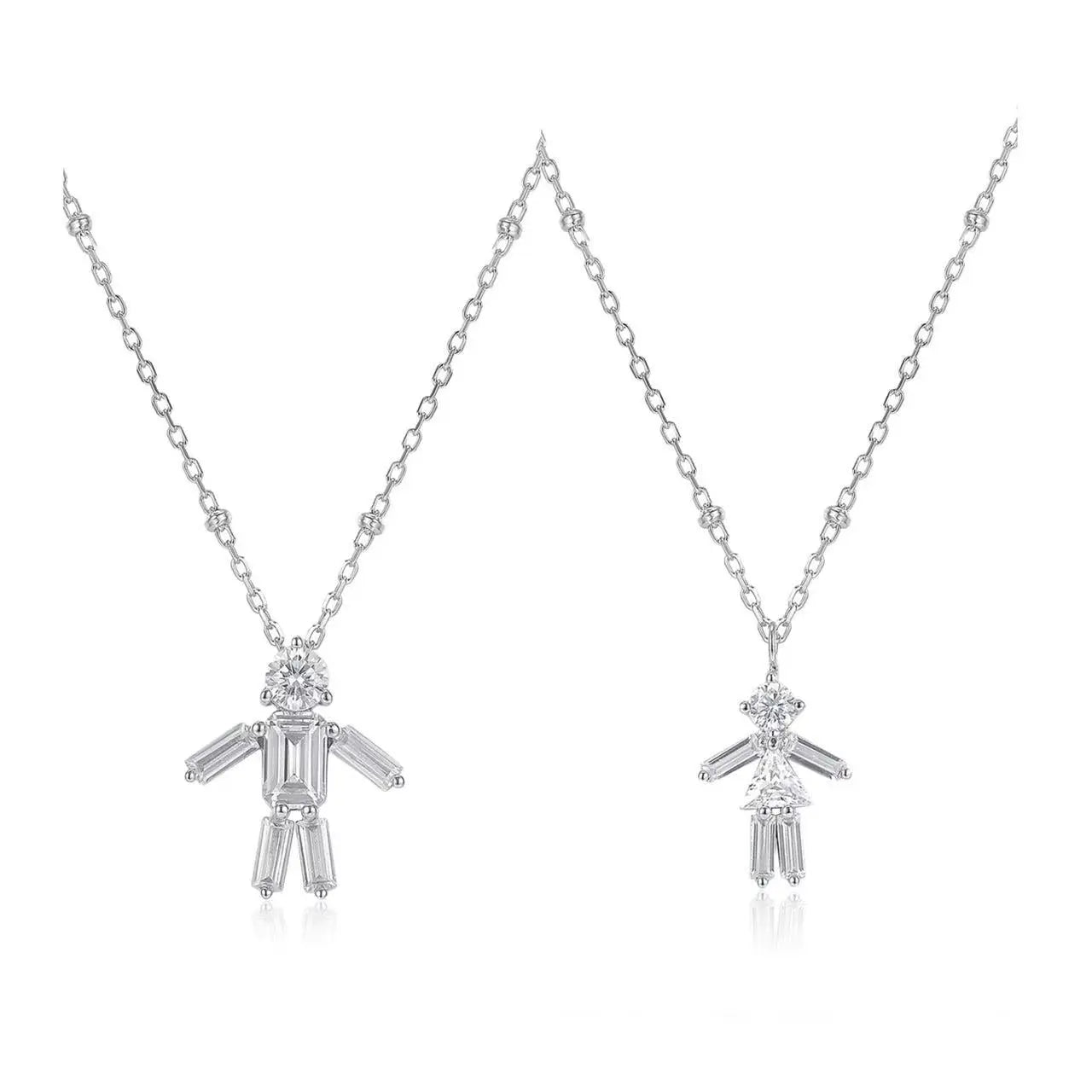 Two silver pendants on chains against a white background