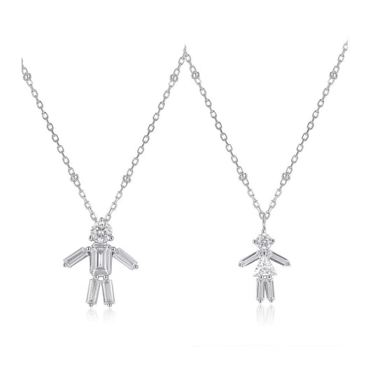 Two silver pendants on chains against a white background