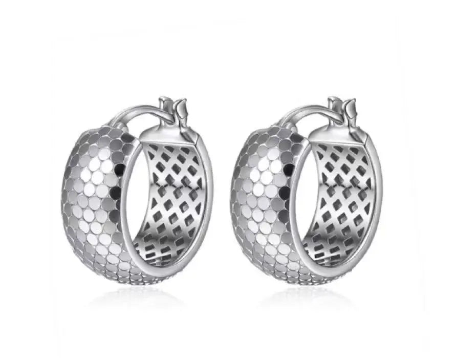 Pair of silver hoop earrings with textured design on a white background
