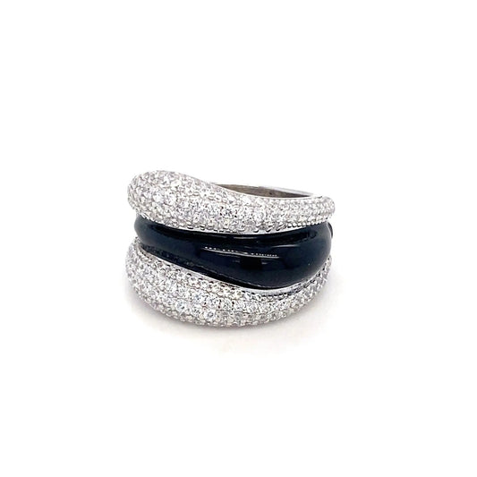 Stack of three rings with glittery silver bands and a black band on a white background