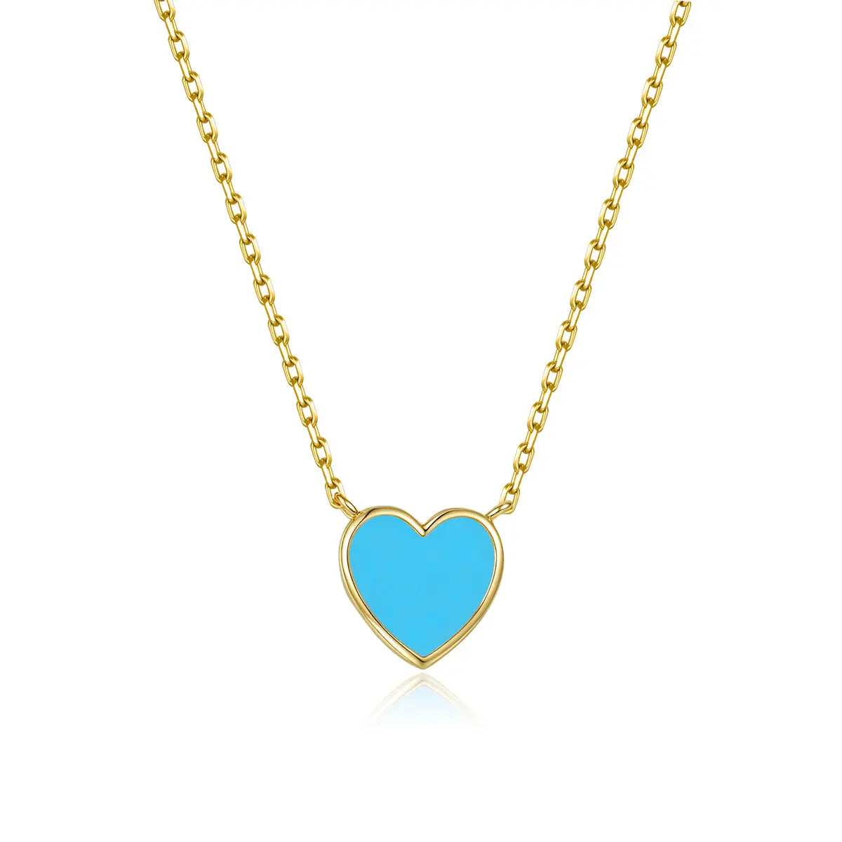 Gold necklace with a blue heart pendant on a white background