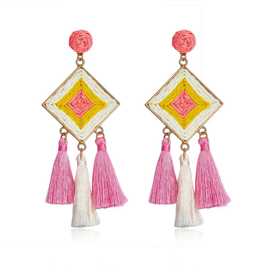 Diamond shaped woven earrings in pink, yellow, and ivory with tassel drops, named Pink Sunshine Drops.