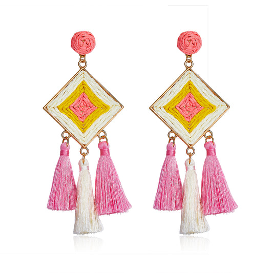 Diamond shaped woven earrings in pink, yellow, and ivory with tassel drops, named Pink Sunshine Drops.
