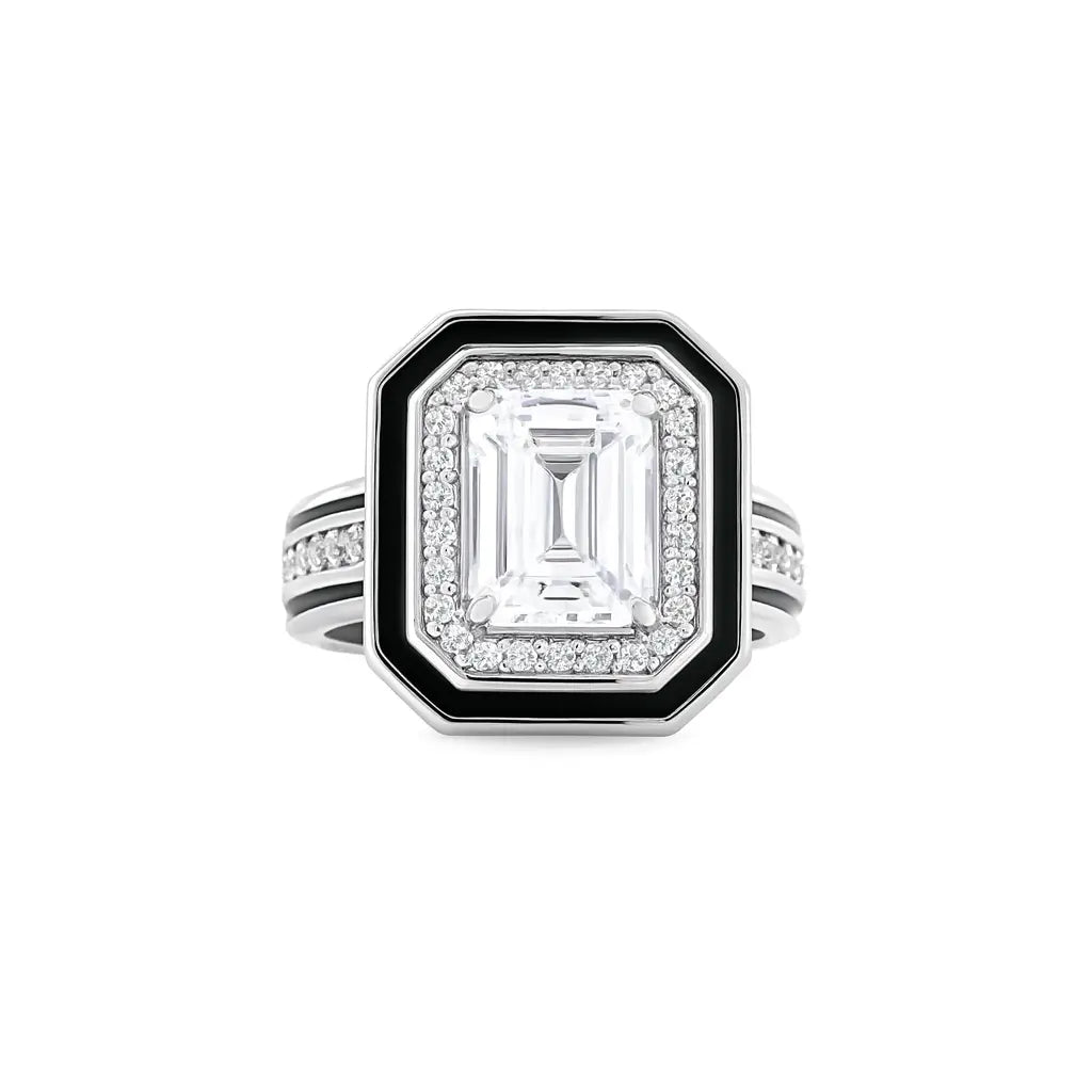 Diamond ring with a black and white design on a white background