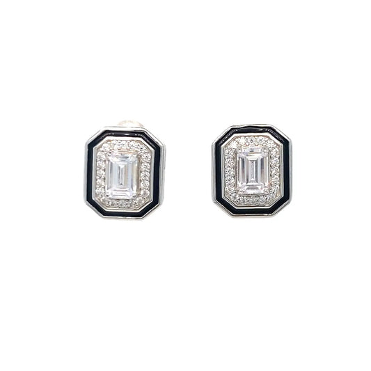 Pair of diamond earrings with black and white design on a white background