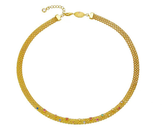 Gold necklace with multicolored stones on a white background
