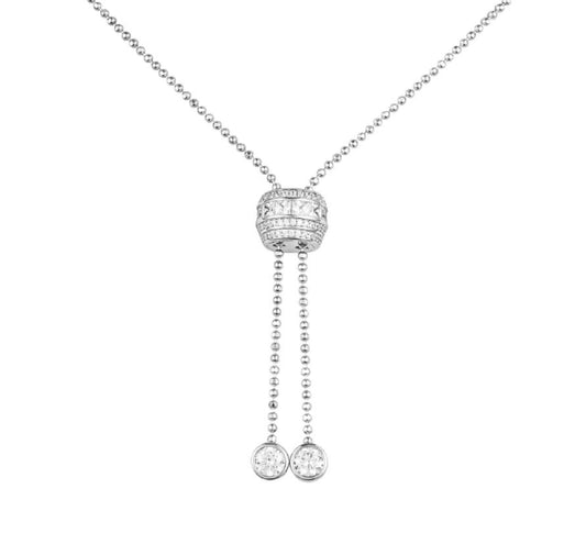 Silver necklace with a pendant and two hanging charms on a white background