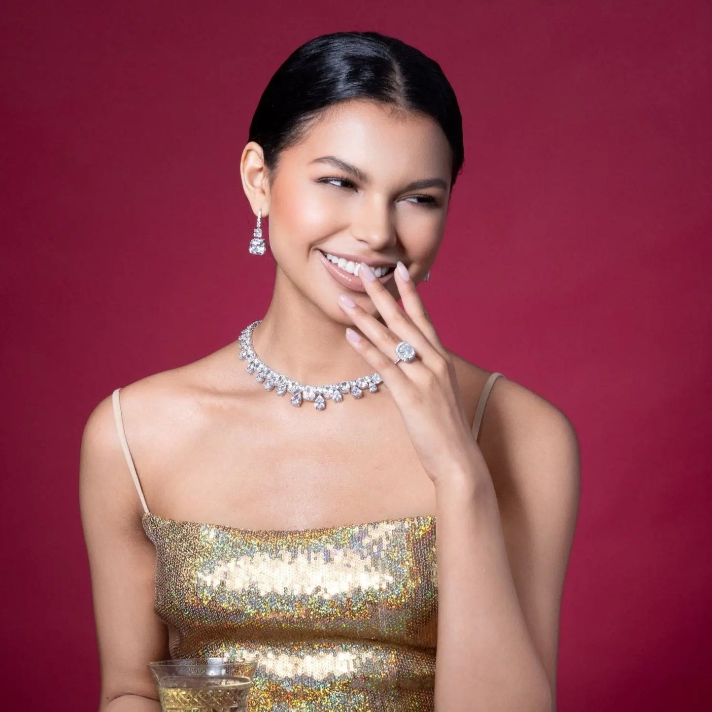 Model wearing Anna Zuckerman Sinfonia 20 Carat Diamond Crystalline Drops with matching jewelry, showcasing elegant sparkle perfect for formal occasions.