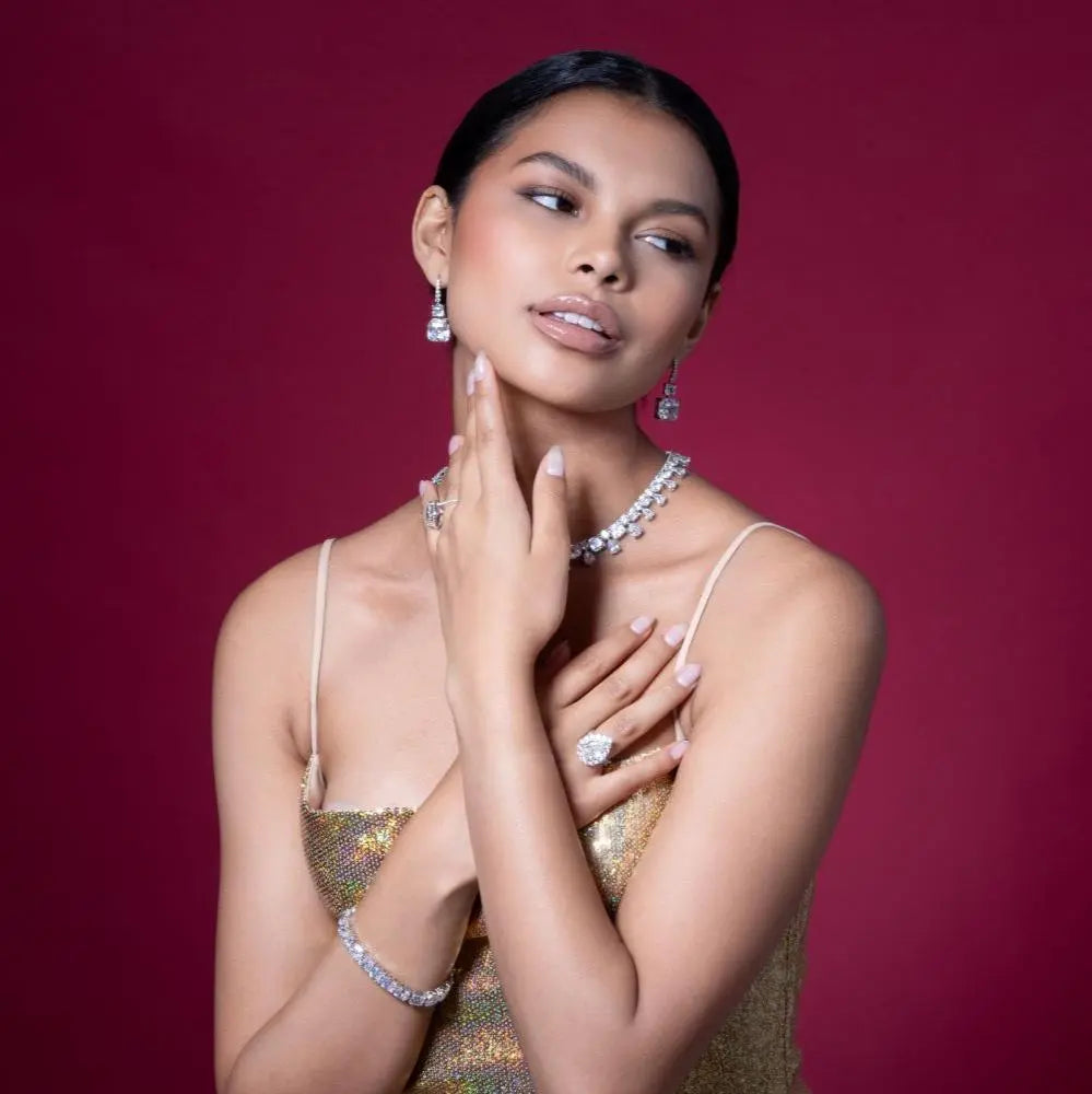 Elegant model styled in Anna Zuckerman Sinfonia 20 Carat Diamond Crystalline Drops, highlighting luxurious drop earrings in a glamorous fashion setting.