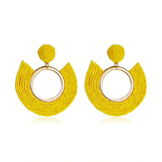 Sunflower yellow half-moon woven earrings with central gold ring.