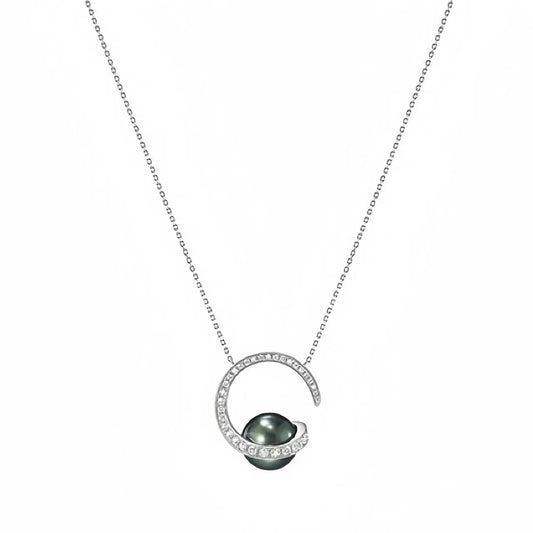 Necklace with a green pearl pendant on a white background