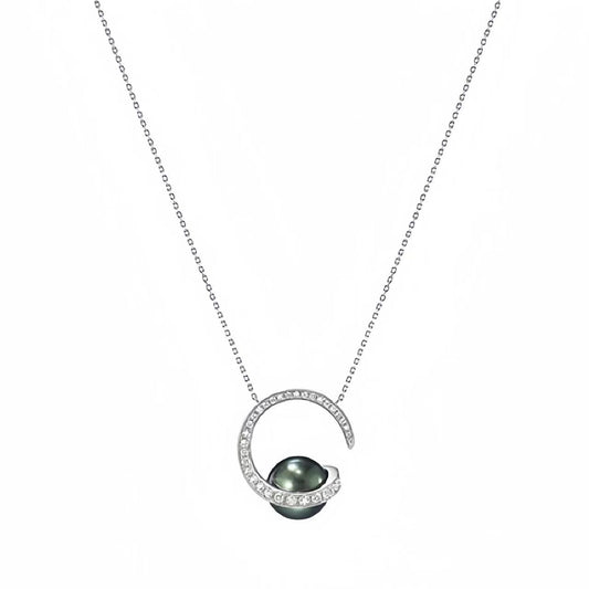 Necklace with a green pearl pendant on a white background