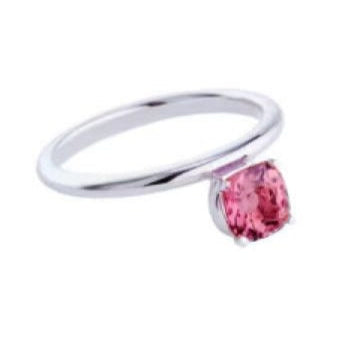 Silver ring with a pink gemstone on a white background