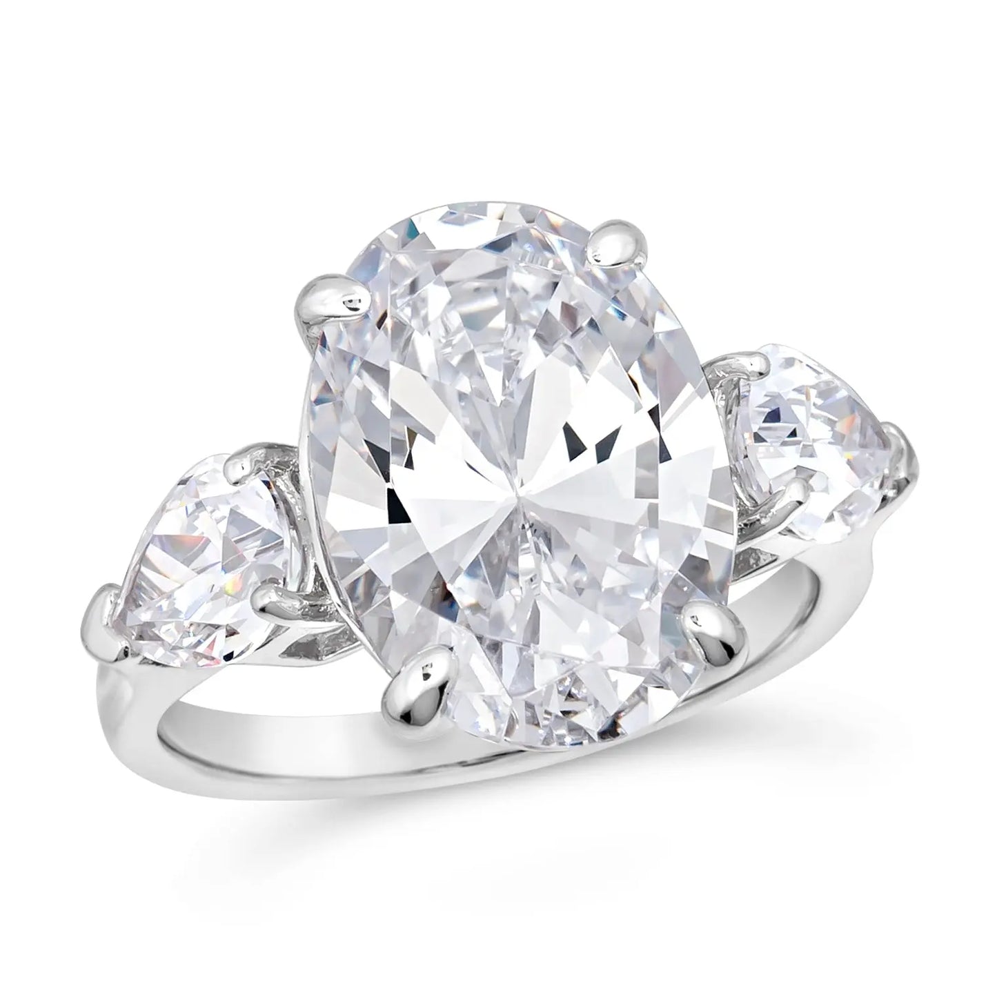 A 5 carat three stone diamond ring with a large central diamond and two smaller diamonds on either side, set in a platinum finish on a silver band.
