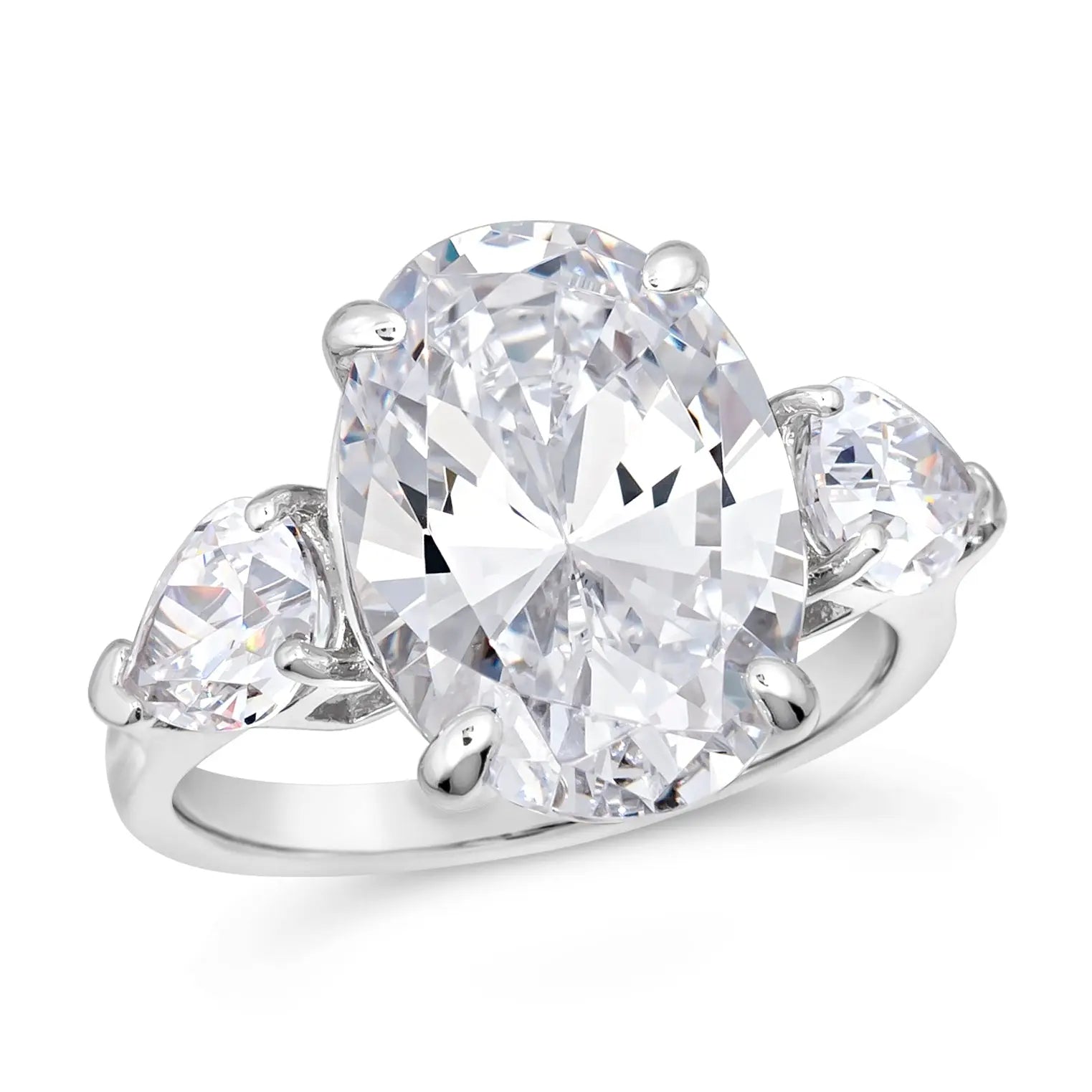A 5 carat three stone diamond ring with a large central diamond and two smaller diamonds on either side, set in a platinum finish on a silver band.